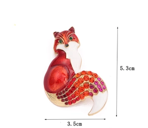 Detail view of colorful crystal fox brooch with dimensions 5.3cm height and 3.5cm width