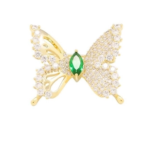 Sparkling butterfly brooch in gold plating with white cubic zirconia and green marquise gem
