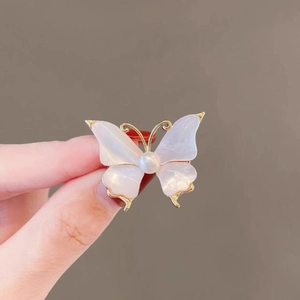 Elegant vintage white butterfly brooch in gold metal with pearl accent for women