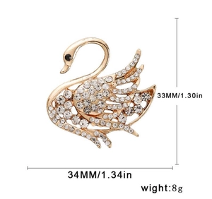 Elegant gold swan brooch pin with sparkling crystal rhinestones and size dimensions