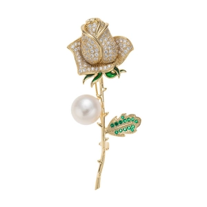 Elegant gold rose brooch with sparkling crystals and a large white pearl pendant