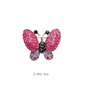 Detail view showing a 2.8x2.4cm purple rhinestone butterfly brooch with rose gold plating