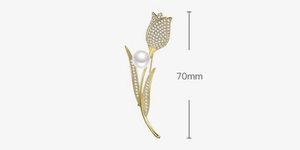 Detailed view of the 70mm tulip brooch with white pearls and micro-set zircons