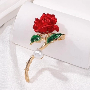 Elegant red rose brooch with enamel petals, green leaves and a white pearl accent