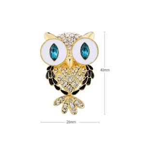 Elegant owl brooch with crystals and white rhinestones, size 40mm by 28mm