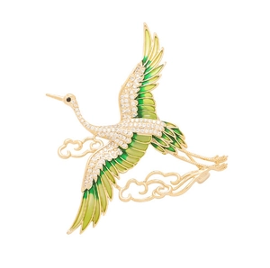 Elegant crane and cloud brooch with green enamel and white cubic zirconia accents