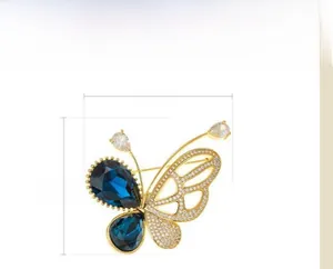 Dimensions détaillées de l'élégante broche papillon avec pierres bleues et cristaux