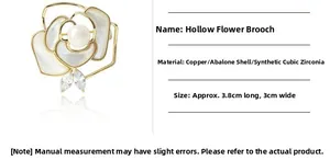 Detailed close-up of a 3.8x3.0cm gold rose brooch with white mother-of-pearl and zirconia