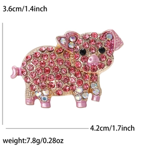 Detailed view of pink pig brooch with size dimensions and sparkling rhinestones