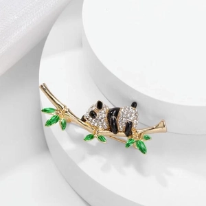 Cute panda brooch with bamboo design featuring crystal rhinestones and green enamel details