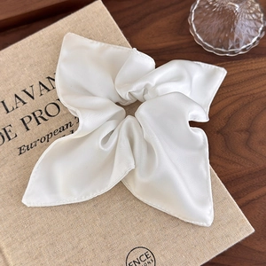 Elegant cream white satin oversized scrunchie hair tie with smooth silk texture