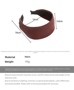 Detailed size specifications of the wide burgundy fabric headband with knitted texture