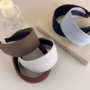 Minimalist wide fabric headband collection in retro colors and matte textured finish