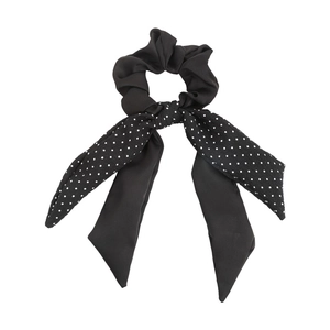 Chic black polka dot bow scrunchie with long ribbons made of soft chiffon fabric