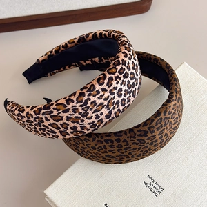 Set of two leopard print padded headbands in light beige and deep brown velvet fabric