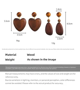 Size chart showing dimensions and weight for geometric wooden heart and teardrop earrings