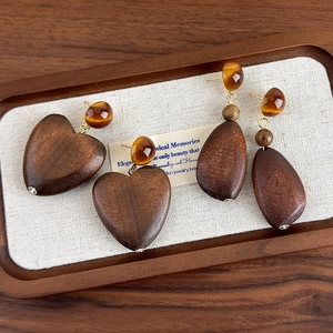 Retro geometric wooden earrings with amber resin beads in heart and teardrop shapes