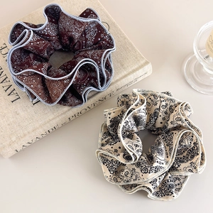 Retro paisley fabric scrunchies set in brown and beige with elegant pleated texture