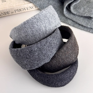 Thick knitted wide headbands for women in grey and brown tones for winter fashion