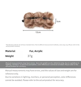 Vue détaillée de la pince banane en peluche léopard avec dimensions 12cm x 5cm et poids 37g