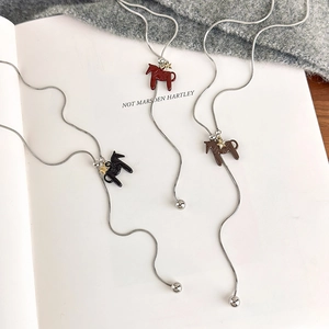 Retro horse pendant necklaces in burgundy, black and brown colors for layered sweater styling