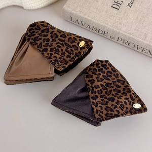 Vintage leopard print triangular hair claw clip with premium leather and gold metal details