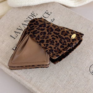Classic leopard print and brown leather hair claw clip with golden metal buckle