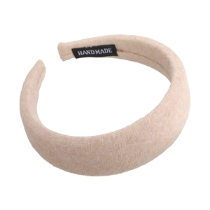 Schicker einfarbiger Wollhaarreif für Damen in Beige mit handgefertigtem Etikett