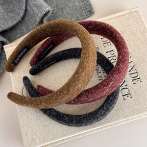 Three-piece felt padded headband set in mustard yellow, burgundy, and charcoal grey tones