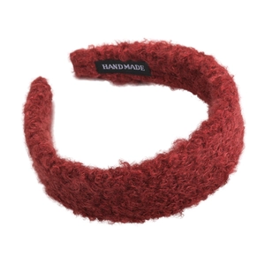 Burgundy faux shearling headband with handmade label for voluminous hair styling