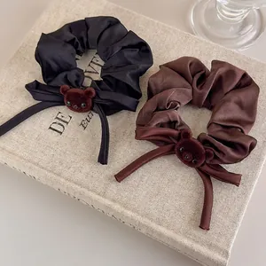 Elegant bear scrunchie set in black and brown satin fabric with ribbon details