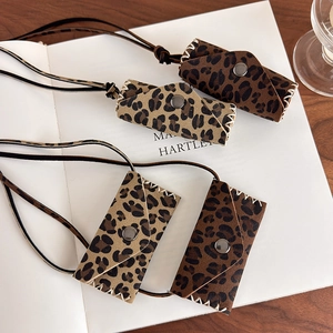 Leopard print mini bag necklace and sweater chain with snap closure in various colors