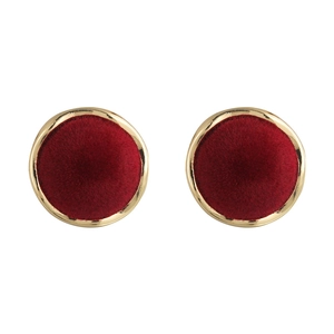 Macro detail of retro burgundy velvet stud earrings with elegant gold metallic borders