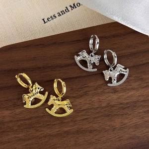 Textured gold and silver rocking horse hoop earrings with sparkling micro-inlaid details