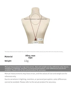 Detail shot of 90cm red wax cord necklace with irregular heart pendant on a model bust