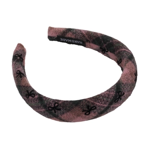 Pink and grey checkered wool headband with black bows for an elegant vintage style