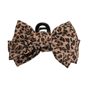 Elegant leopard print bow hair claw clip made of layered fabric for high-end styling
