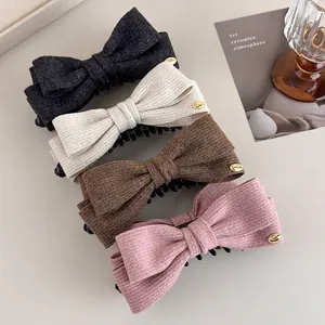 Elegant wool fabric bow banana clips set in gray, cream, brown, and pink for women