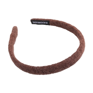Dark brown wool knit headband for women featuring a handmade label and high crown design