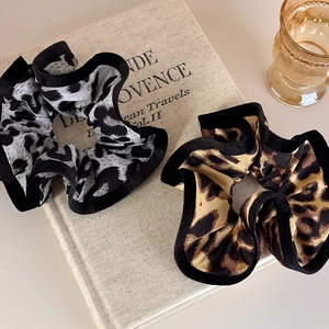 Elegant leopard print scrunchies with velvet edges for vintage hair styling