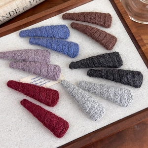 Colorful knitted wool snap hair clips set for women with vintage aesthetic background