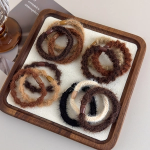 High-elastic plush hair tie set in earth tones with stylish oval resin buckles