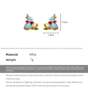 Detail view of rabbit enamel earrings with pearls, dimensions 1.5cm by 1.4cm