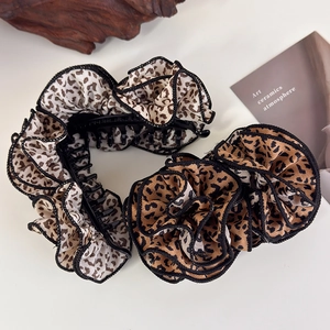 Leopard print banana hair clips with black pleated trim for vintage French styling