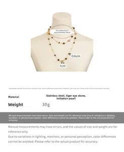 Detail of tiger eye and pearl double-layer necklace on mannequin with size measurements