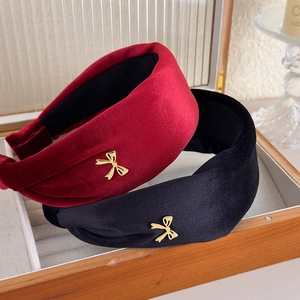 Elegant wide velvet headband with gold butterfly detail in burgundy and black colors