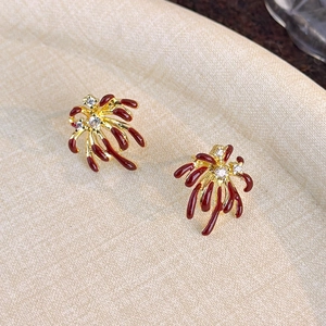 Elegant gold-plated firework earrings with deep red enamel and sparkling zircons