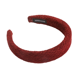 Padded burgundy velvet headband for women with textured fabric and handmade label