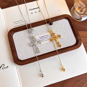 Tiger eye cross pendant necklaces in gold and silver finish with crystal embellishments