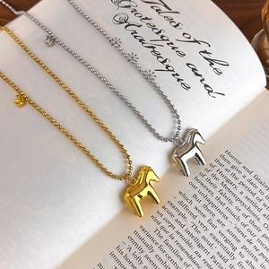 Elegant bead chain necklace with gold and silver minimalist horse pendant for women